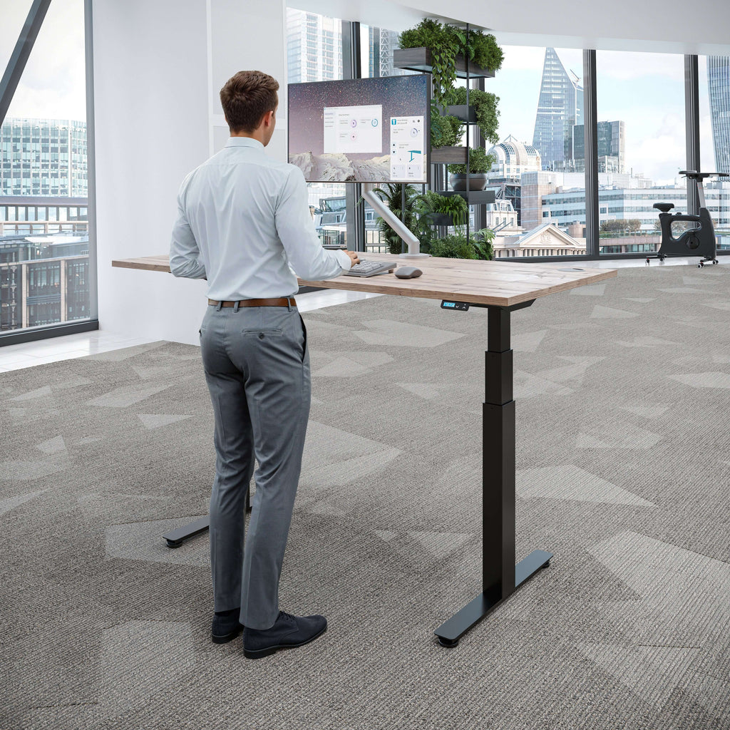 iLohas Active 2+ standing desk in a modern office, adjustable height for ergonomic work experience.