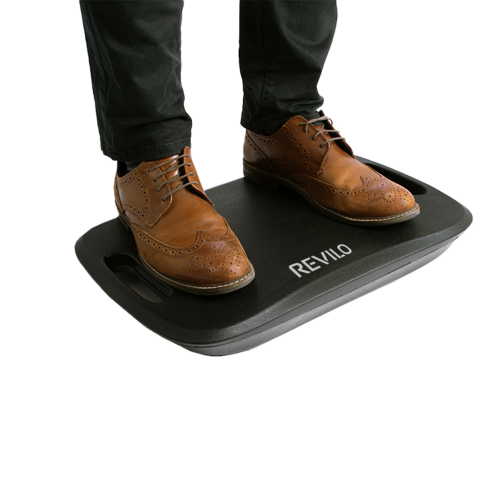 Person standing on Revilo Coreboard Plus balance board for posture improvement - Black.
