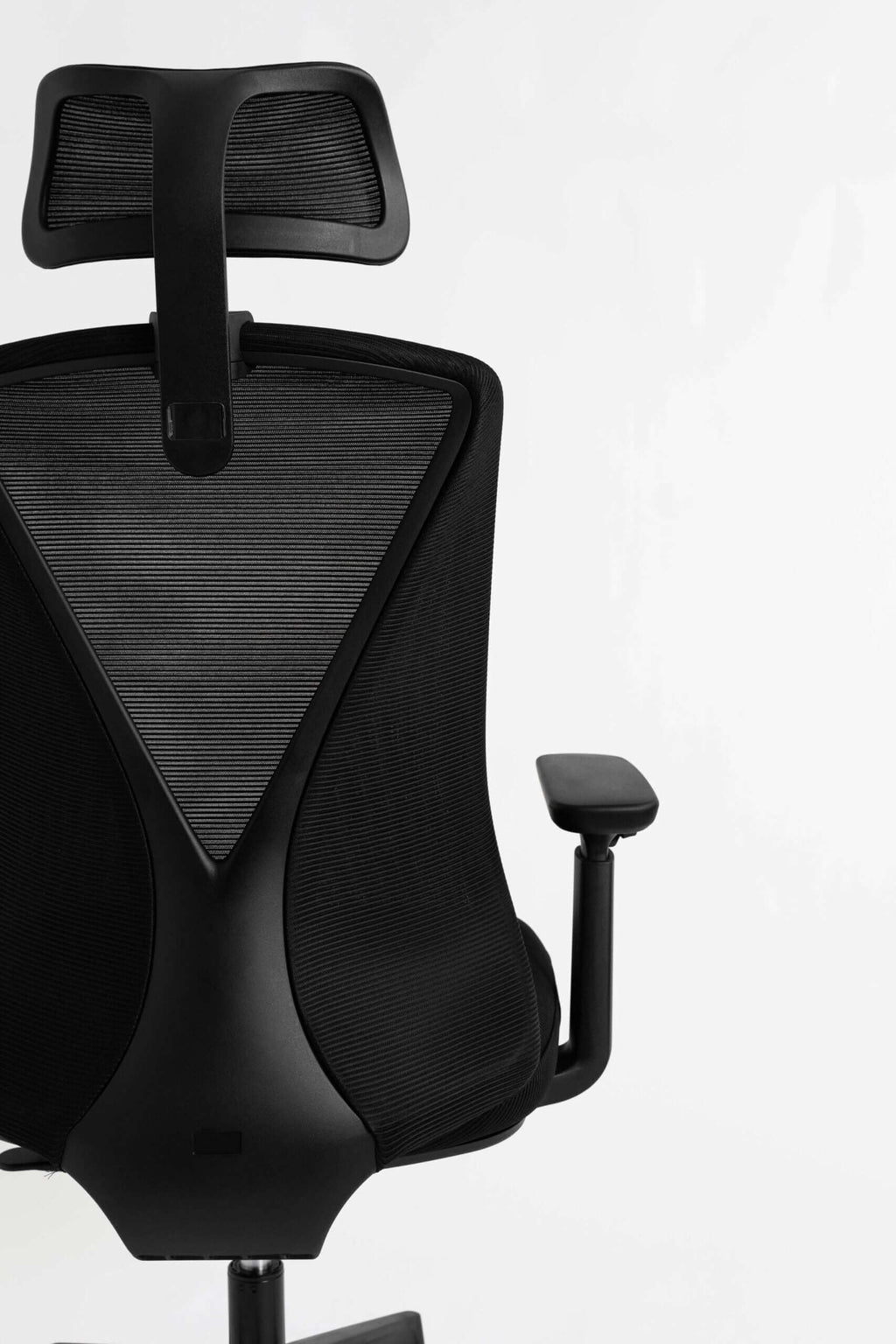 Butterfly ergonomic office chair showing Y-shaped backrest and adjustable arms.