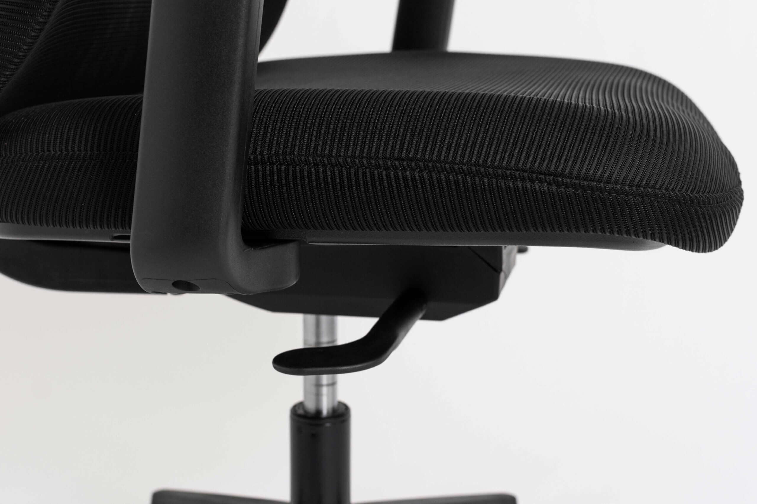 Close-up of the Butterfly ergonomic office chair showing adjustable lever on the seat for optimal comfort.
