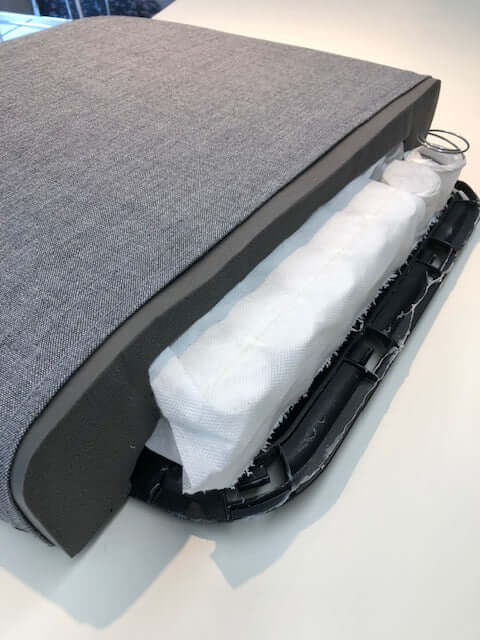 Close-up of Toleo ergonomic swivel task chair seat cushion, showcasing its comfortable padding and support features.